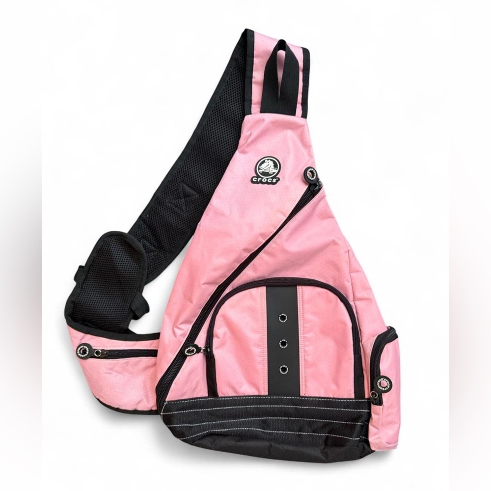 CROCS pink sling bag. Excellent condition, super roomy. Multiple zip pockets